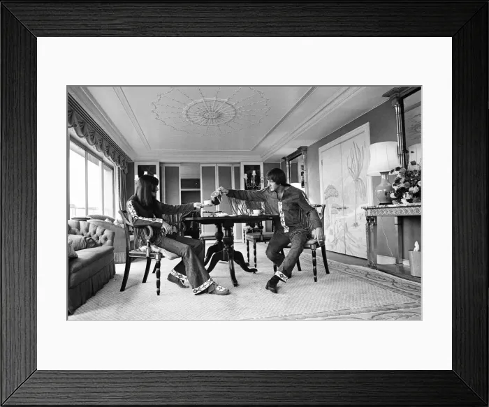 Framed Print : Sonny Bono & Cher, American music duo, pictured in their rooms at the Royal Garden Hotel