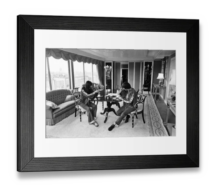 Framed Print : Sonny Bono & Cher, American music duo, pictured in their rooms at the Royal Garden Hotel