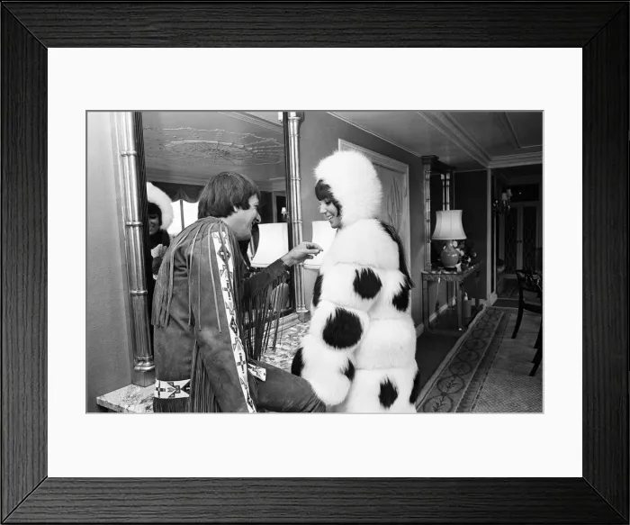 Framed Print : Sonny Bono & Cher, American music duo, pictured in their rooms at the Royal Garden Hotel Framed Print : Sonny Bono & Cher, American music duo, pictured in their rooms at the Royal Garden Hotel