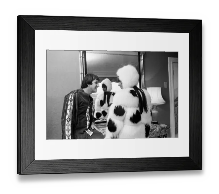 Framed Print : Sonny Bono & Cher, American music duo, pictured in their rooms at the Royal Garden Hotel