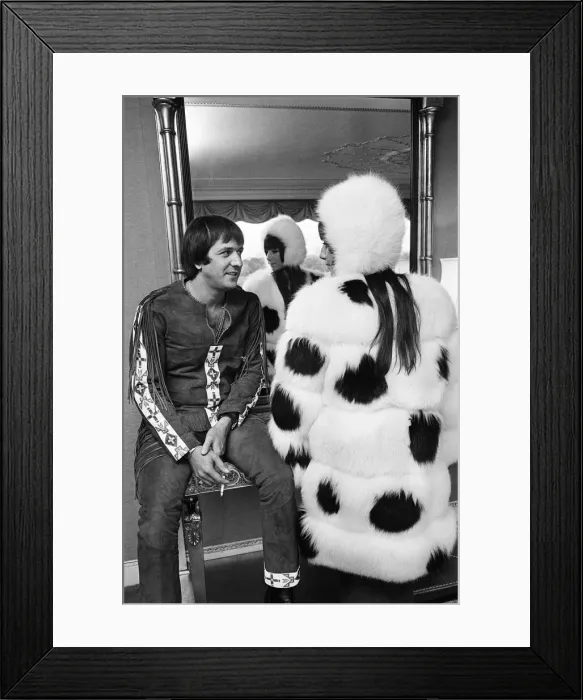 Framed Print : Sonny Bono & Cher, American music duo, pictured in their rooms at the Royal Garden Hotel Framed Print : Sonny Bono & Cher, American music duo, pictured in their rooms at the Royal Garden Hotel