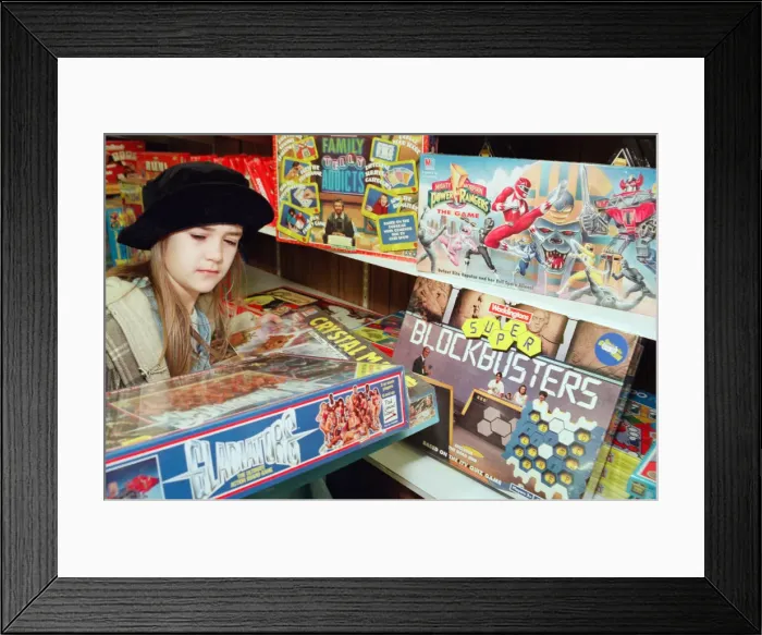 Framed Print : Nine year old Gemma Coakley from Easterside checks out the latest games from Telly Framed Print : Nine year old Gemma Coakley from Easterside checks out the latest games from Telly