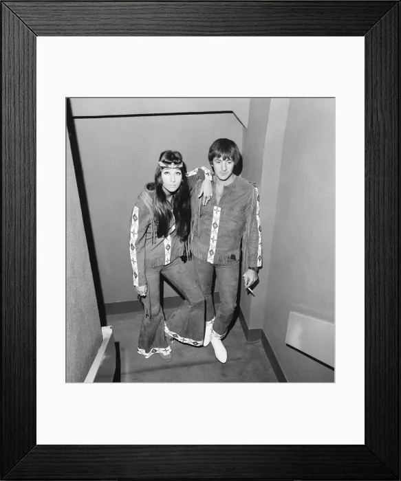 Framed Print : Sonny Bono & Cher, American music duo, pictured at the Royal Garden Hotel, London Framed Print : Sonny Bono & Cher, American music duo, pictured at the Royal Garden Hotel, London