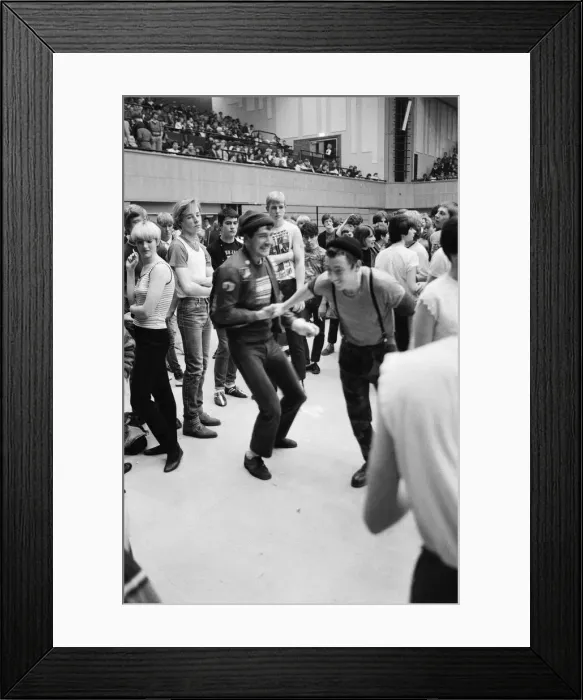 Framed Print : Paul Weller, and his band, The Jam, pictured during their final ever gig in 1982 Framed Print : Paul Weller, and his band, The Jam, pictured during their final ever gig in 1982