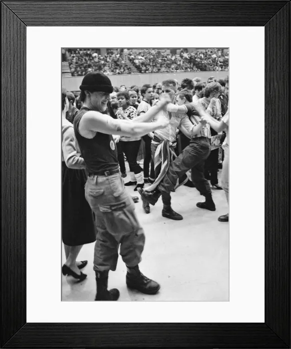 Framed Print : Paul Weller, and his band, The Jam, pictured during their final ever gig in 1982 Framed Print : Paul Weller, and his band, The Jam, pictured during their final ever gig in 1982