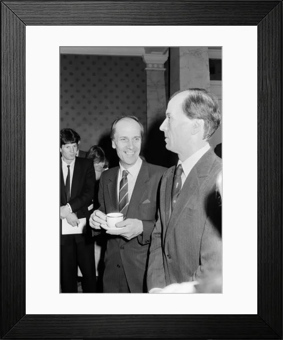 Framed Print : The real Norman Tebbit stands with a wax work of himself at a preview of his wax portrait Framed Print : The real Norman Tebbit stands with a wax work of himself at a preview of his wax portrait