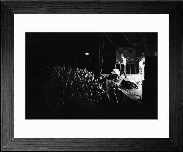 Framed Print : Paul Weller, and his band, The Jam, pictured during their final ever gig in 1982 Framed Print : Paul Weller, and his band, The Jam, pictured during their final ever gig in 1982