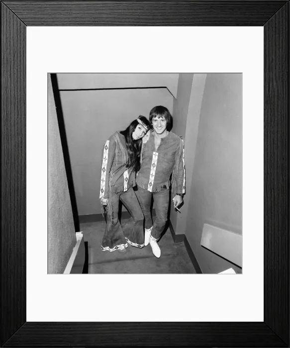Framed Print : Sonny Bono & Cher, American music duo, pictured at the Royal Garden Hotel, London Framed Print : Sonny Bono & Cher, American music duo, pictured at the Royal Garden Hotel, London