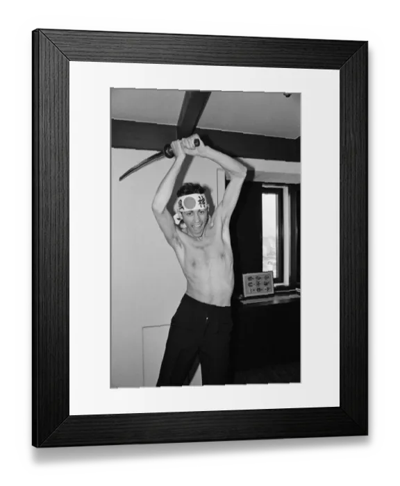 Framed Print : The Boomtown Rats in Tokyo. Pictured, singer Bob Geldof with a sword. May 1980
