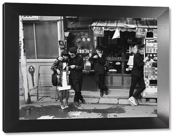 The Boomtown Rats in Tokyo, some of the group members pictured outside a Tokyo shop
