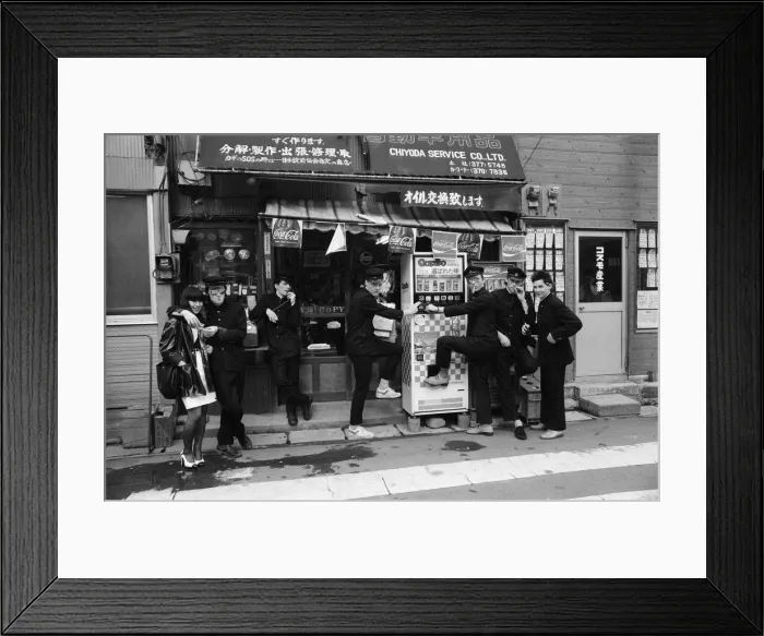 Framed Print : The Boomtown Rats in Tokyo, group members pictured outside a Tokyo shop. May 1980