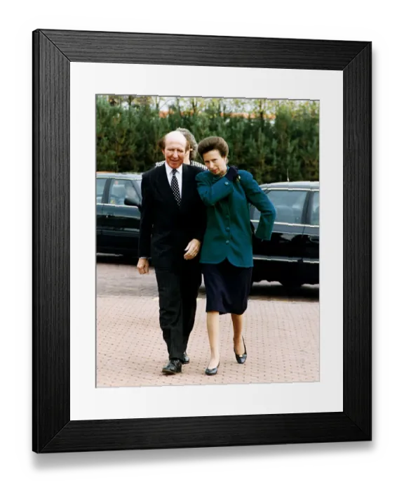 Framed Print : Princess Anne arriving SECC Glasgow dark green jacket navy skirt adjusting shoulder bag
