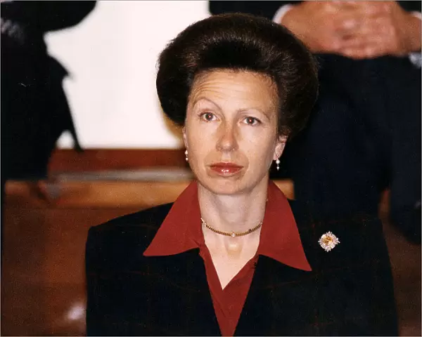 Princess Anne in Aberfoyle open necked red shirt collar outside black jacket brooch gold