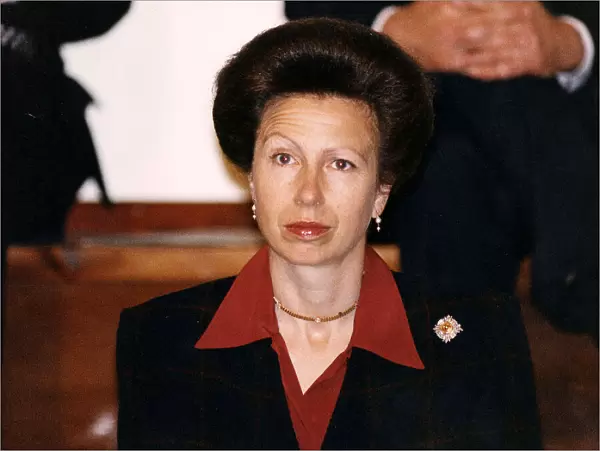 Princess Anne in Aberfoyle open necked red shirt collar outside black jacket brooch gold