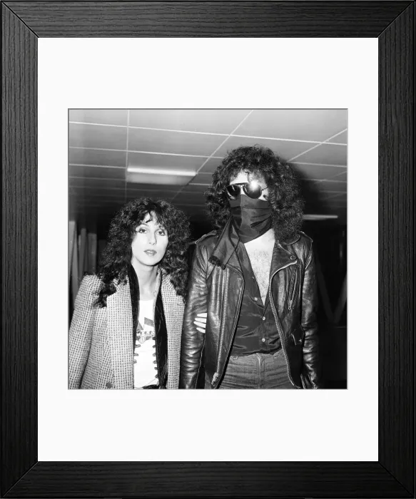 Framed Print : American singer Cher and Gene Simmons, bass guitarist with rock group Kiss, Arrivals Framed Print : American singer Cher and Gene Simmons, bass guitarist with rock group Kiss, Arrivals