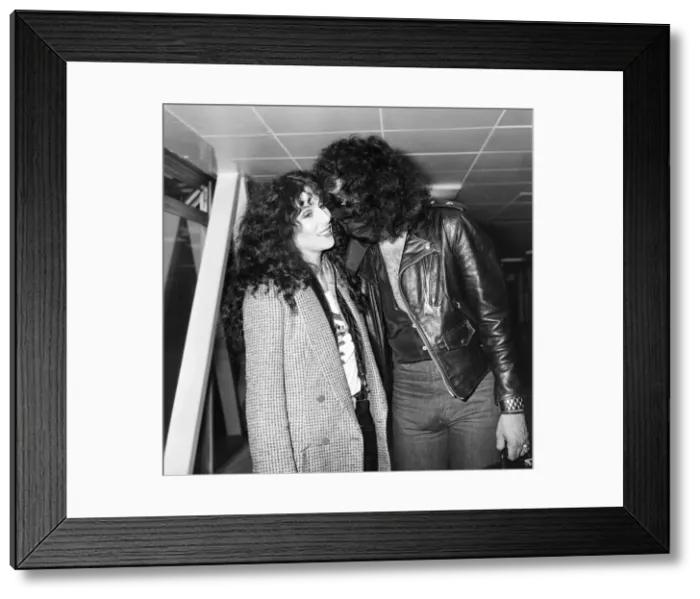 Framed Print : American singer Cher and Gene Simmons, bass guitarist with rock group Kiss, Arrivals Framed Print : American singer Cher and Gene Simmons, bass guitarist with rock group Kiss, Arrivals