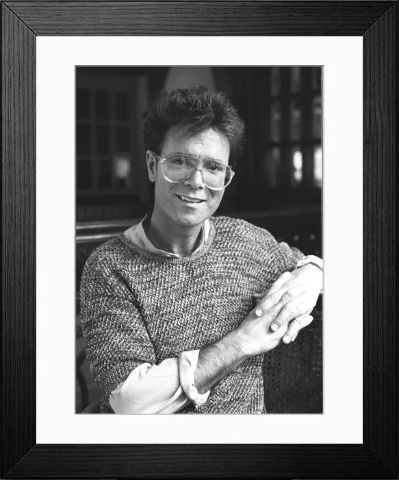 Framed Print : Cliff Richard sitting in a church - 29th July 1987 Framed Print : Cliff Richard sitting in a church - 29th July 1987
