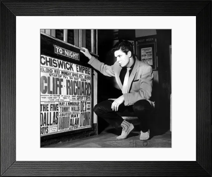 Framed Print : CLIFF RICHARD LOOKING AT CONCERT POSTER WITH HIS NAME AS TOP-BILLING - 1958 Framed Print : CLIFF RICHARD LOOKING AT CONCERT POSTER WITH HIS NAME AS TOP-BILLING - 1958
