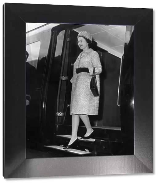 Queen Elizabeth II steps off the Royal Train at Bryn Station. 17th May 1968