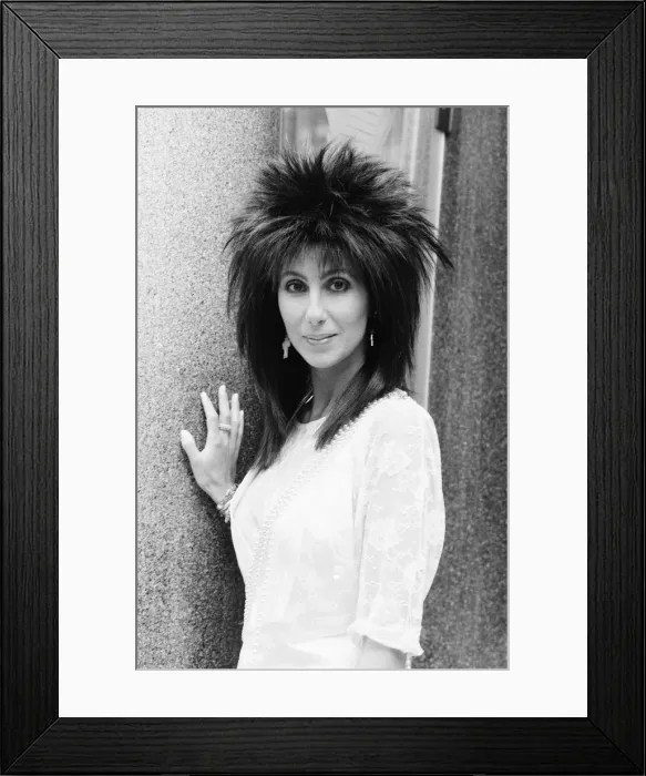 Framed Print : Cher, American singer and actress, in London for the premiere of her new film, Mask Framed Print : Cher, American singer and actress, in London for the premiere of her new film, Mask