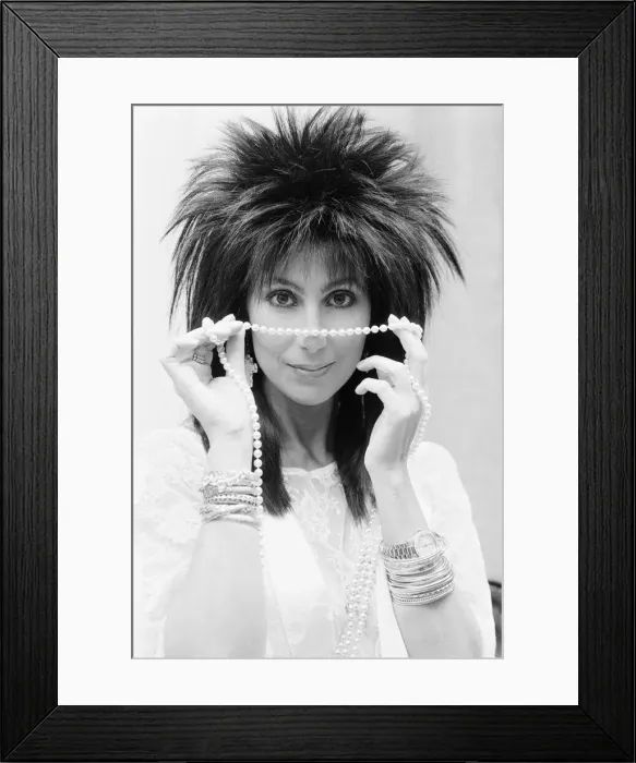 Framed Print : Cher, American singer and actress, in London for the premiere of her new film, Mask Framed Print : Cher, American singer and actress, in London for the premiere of her new film, Mask