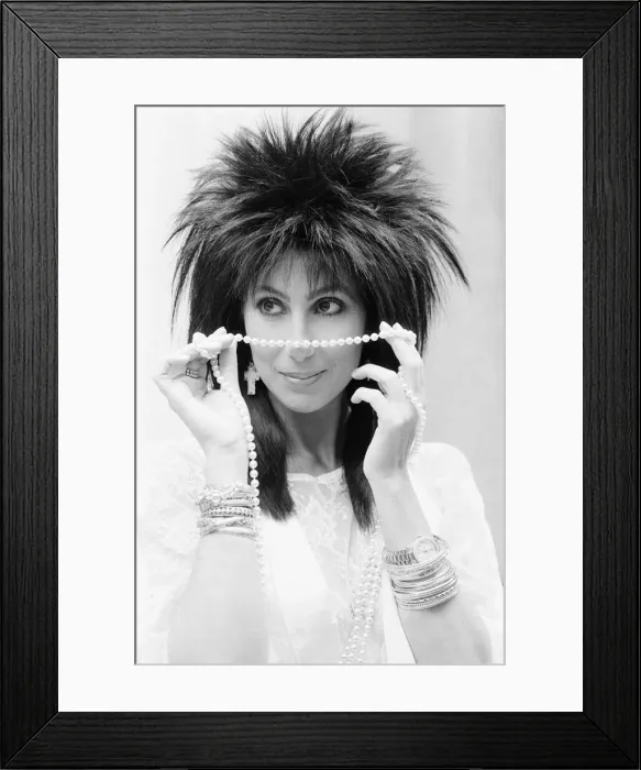 Framed Print : Cher, American singer and actress, in London for the premiere of her new film, Mask