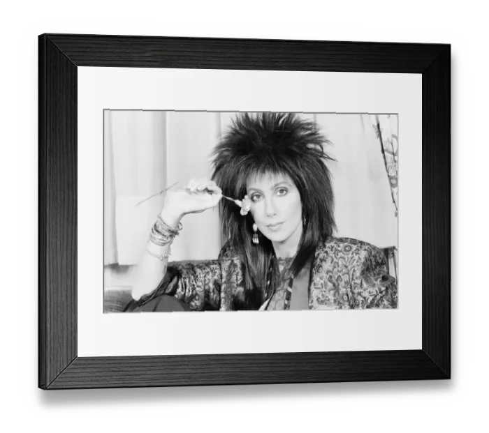 Framed Print : Cher, American singer and actress, in London for the premiere of her new film, Mask