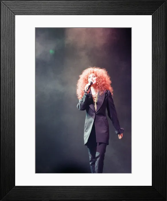 Framed Print : Cher, American singer, Love Hurts Tour, concert at Wembley Arena, London Framed Print : Cher, American singer, Love Hurts Tour, concert at Wembley Arena, London