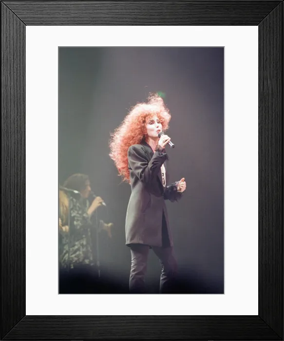 Framed Print : Cher, American singer, Love Hurts Tour, concert at Wembley Arena, London Framed Print : Cher, American singer, Love Hurts Tour, concert at Wembley Arena, London
