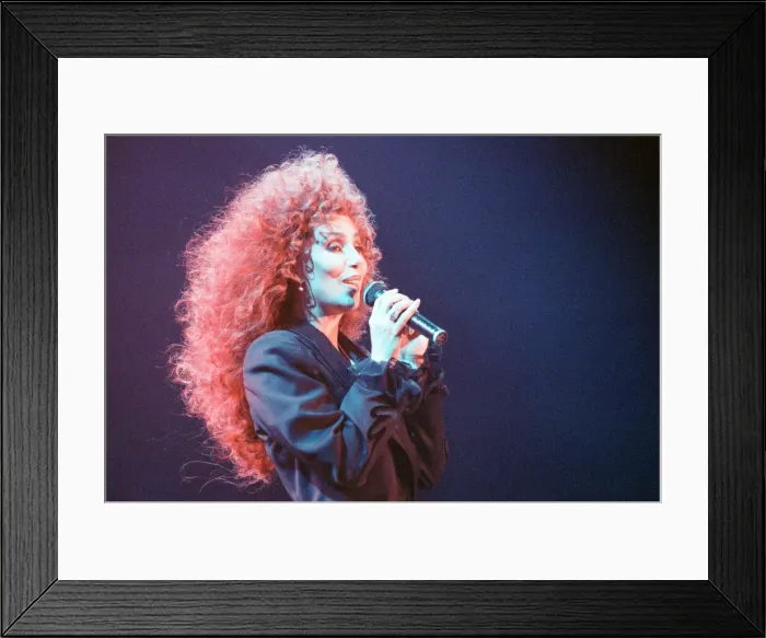 Framed Print : Cher, American singer, Love Hurts Tour, concert at Wembley Arena, London Framed Print : Cher, American singer, Love Hurts Tour, concert at Wembley Arena, London