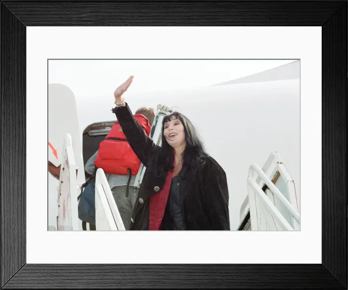 Framed Print : Cher, American singer and actress at London Gatwick Airport