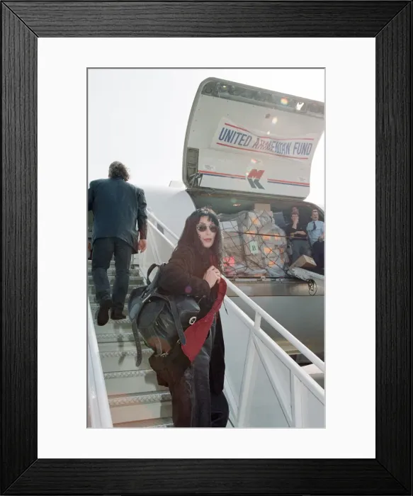 Framed Print : Cher, American singer and actress at London Gatwick Airport