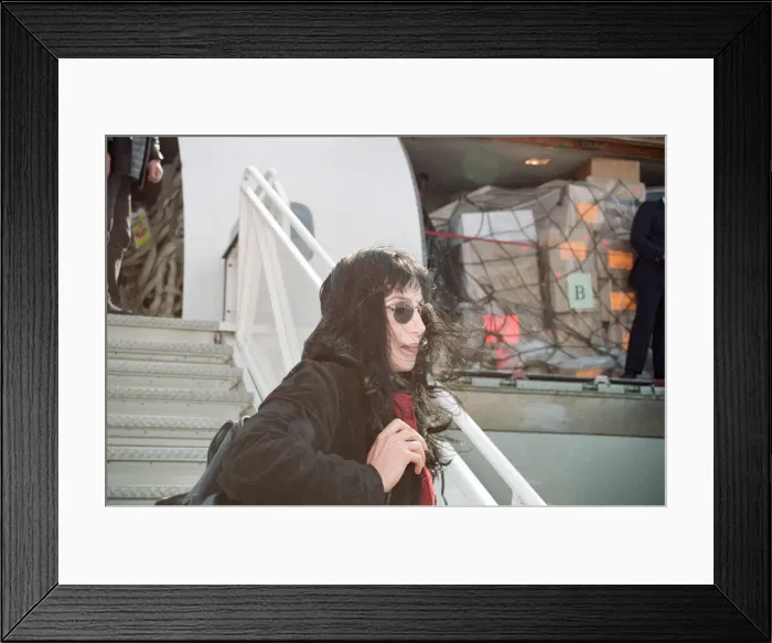 Framed Print : Cher, American singer and actress at London Gatwick Airport