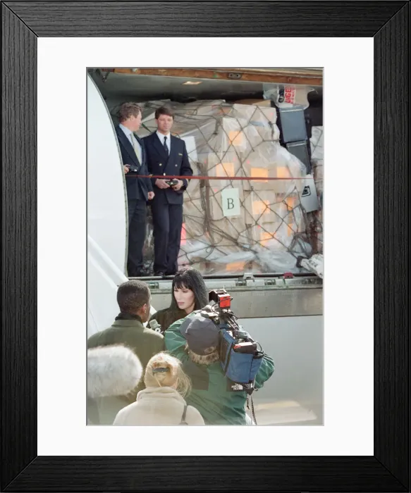 Framed Print : Cher, American singer and actress at London Gatwick Airport