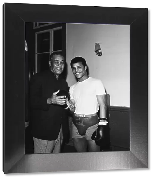 American former world heavyweight boxing champion Joe Louis (left