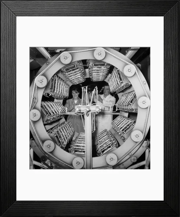 Framed Print : Lucas factory. Operators in the illuminating department where head lamp reflectors are