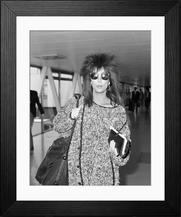 Framed Print : Cher, American actress and singer, Departures, London Heathrow Airport Framed Print : Cher, American actress and singer, Departures, London Heathrow Airport