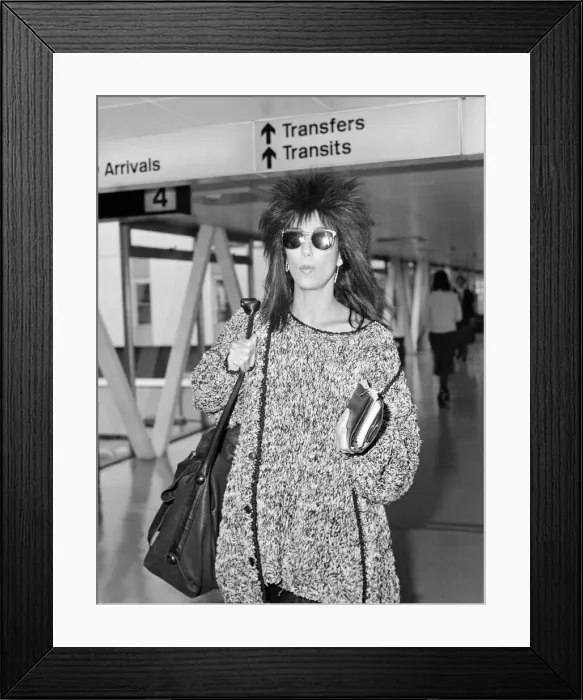 Framed Print : Cher, American actress and singer, Departures, London Heathrow Airport Framed Print : Cher, American actress and singer, Departures, London Heathrow Airport
