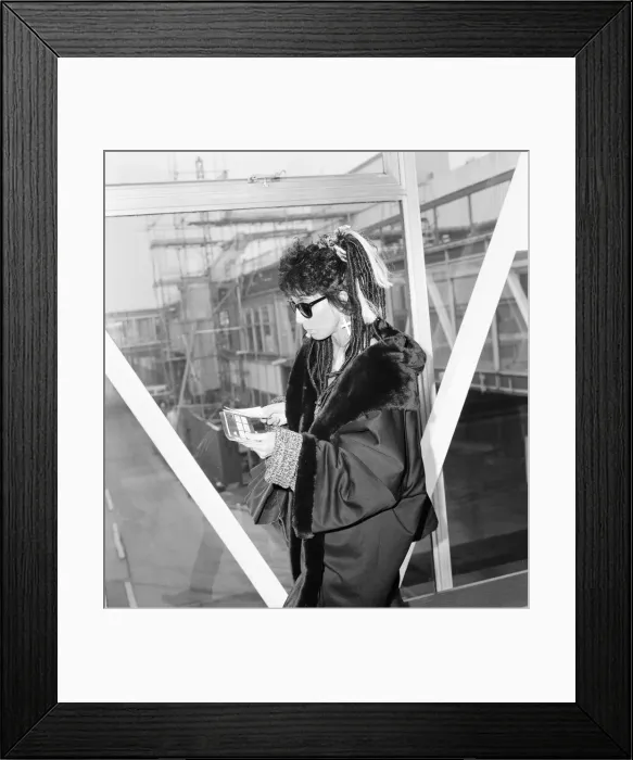 Framed Print : Cher, American actress and singer, Departures, London Heathrow Airport Framed Print : Cher, American actress and singer, Departures, London Heathrow Airport