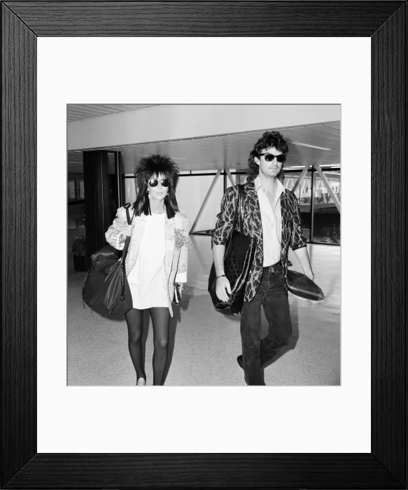 Framed Print : Cher, American actress and singer, Departures, London Heathrow Airport