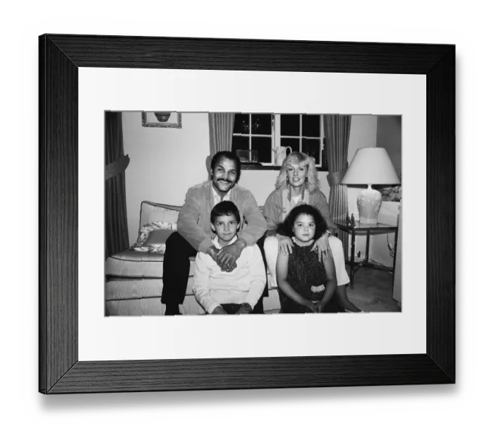 Framed Print : Ex-World Boxing Champion John Conteh at home with wife Veronica and two children Framed Print : Ex-World Boxing Champion John Conteh at home with wife Veronica and two children