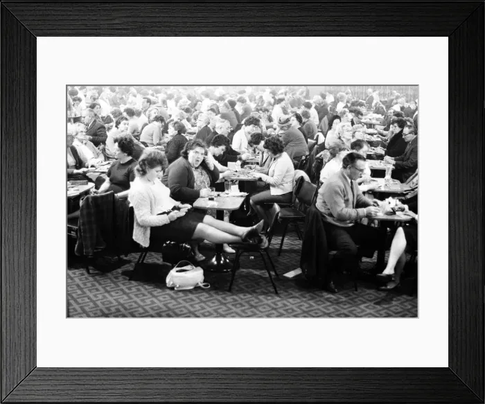 Framed Print : The young and the not so young mix as they get eyes down Framed Print : The young and the not so young mix as they get eyes down