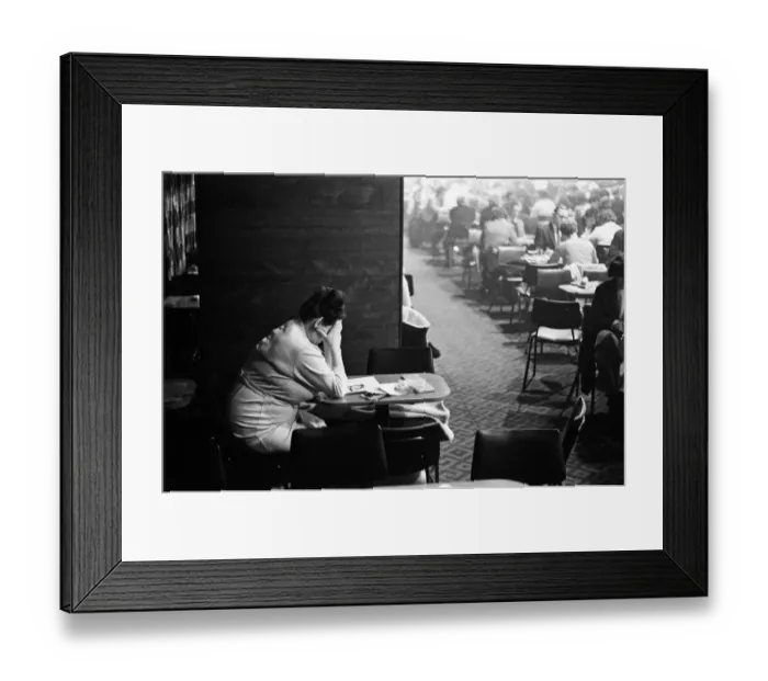 Framed Print : The young and the not so young mix as they get eyes down