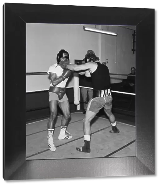 Light heavyweight boxer John Conteh (right) sparring with Joe Bugner. 25th May 1972