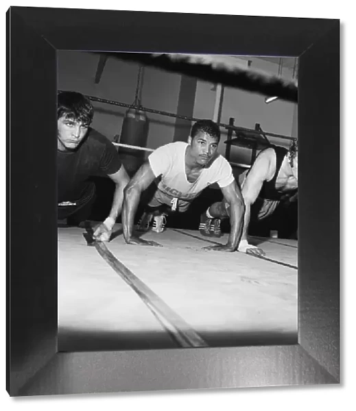 Light heavyweight boxer John Conteh (centre) and heavy weight boxer Joe Bugner (right