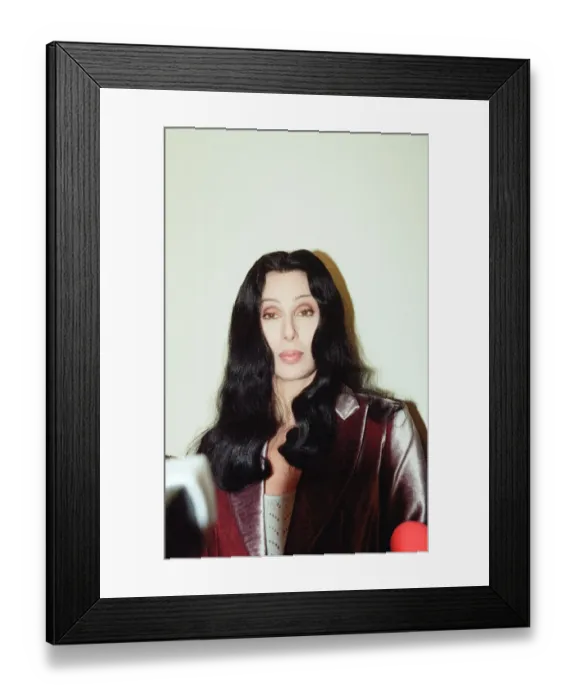 Framed Print : Cher, American singer and actress, at the Look Ahead hostel project in Dock Street