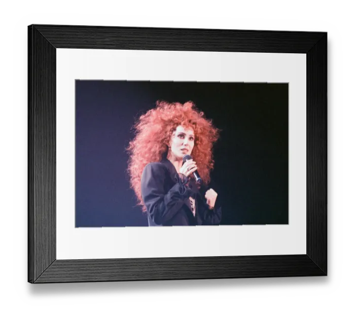 Framed Print : Cher, American singer, Love Hurts Tour, concert at Wembley Arena, London Framed Print : Cher, American singer, Love Hurts Tour, concert at Wembley Arena, London