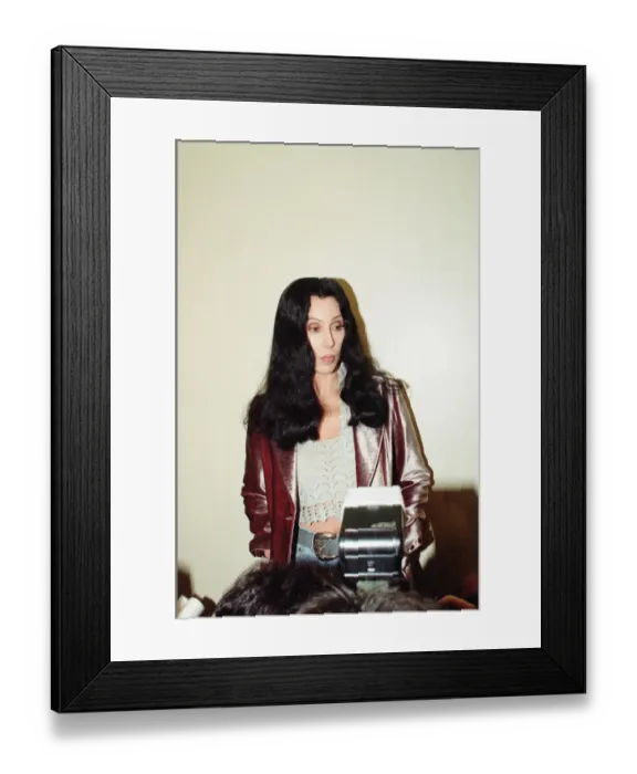 Framed Print : Cher, American singer and actress, at the Look Ahead hostel project in Dock Street