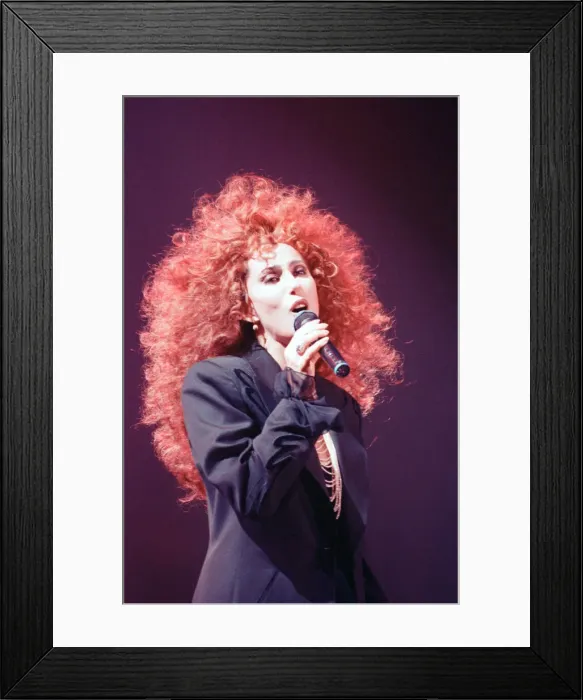 Framed Print : Cher, American singer, Love Hurts Tour, concert at Wembley Arena, London Framed Print : Cher, American singer, Love Hurts Tour, concert at Wembley Arena, London