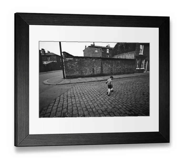 Framed Print : Children playing football in Archie Street, Manchester. Archie Street was the inspiration
